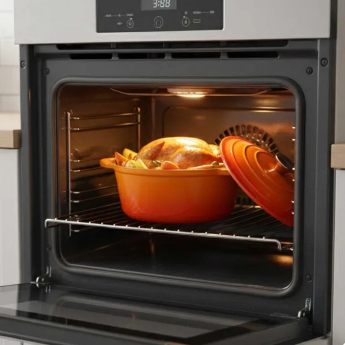 Garnek żeliwny emaliowany HAGE 4L 24 cm pomarańczowy